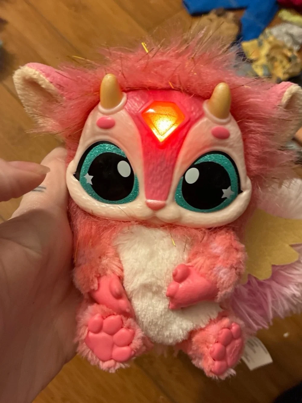 Magic mixies yellow and pink plush toy with glittery eyes and yellow horns